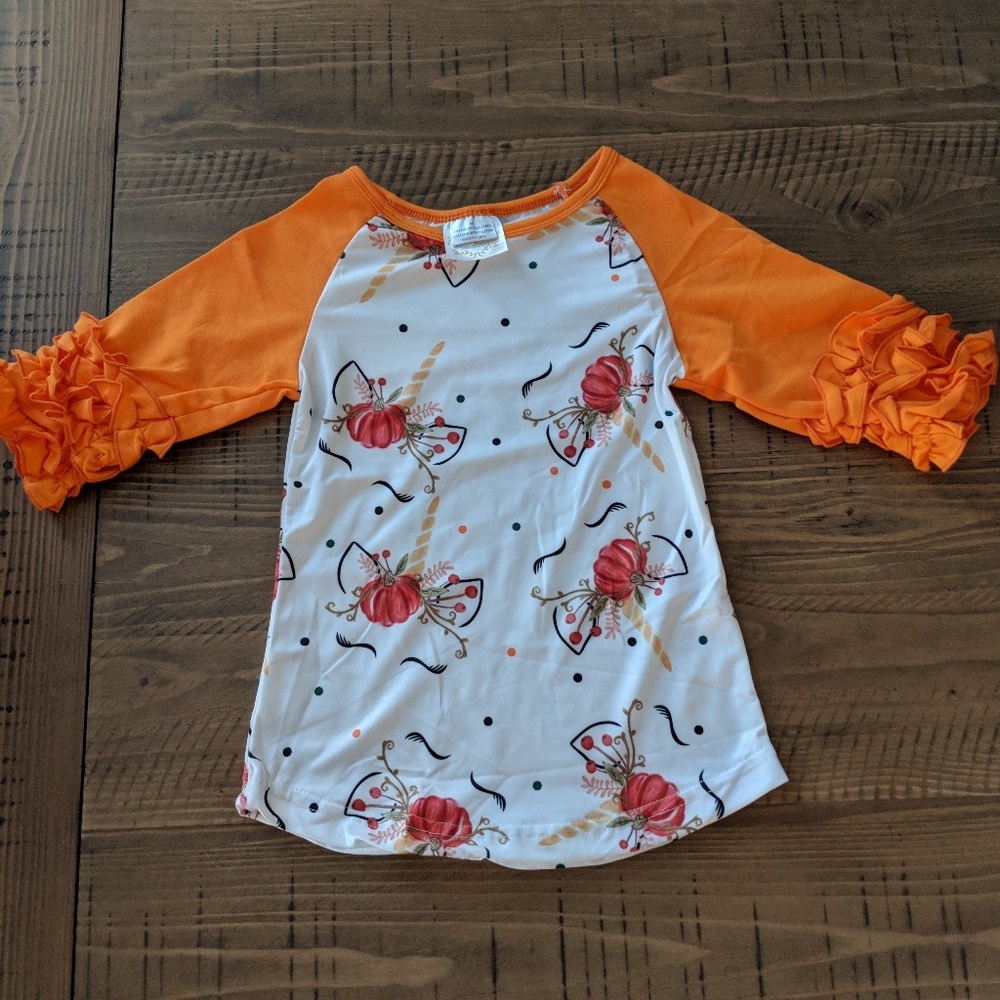 Toddler shirt with Unicron and pumpkins